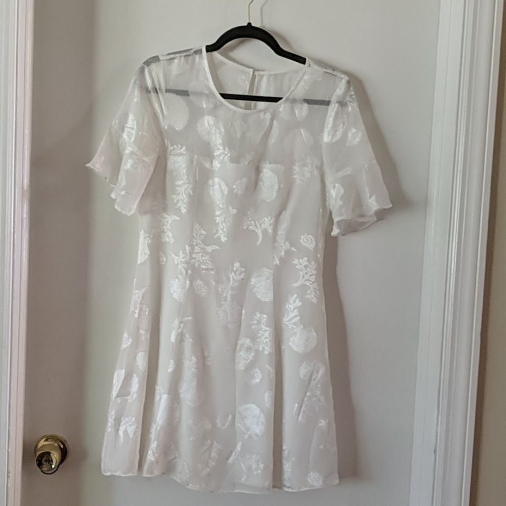 Lulu's white rehearsal dinner dress